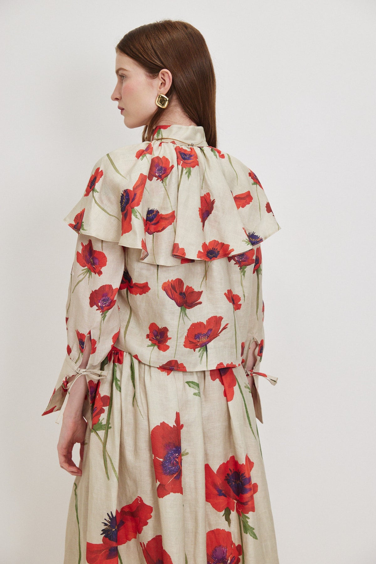 Fitted bodice, ankle-length skirt with zipper closure at the back